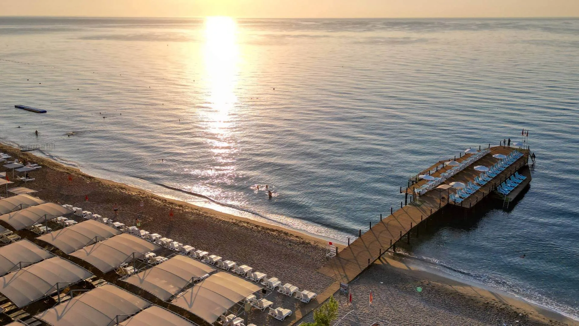 The hotel beach at sunset